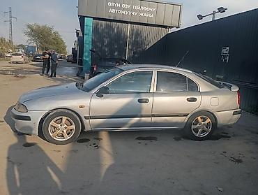 Унаа сатуу: Mitsubishi Carisma: 2001 г., 0.6 л, Кол менен иштөөчү, Газ, Седан — 4