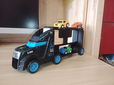 Игрушки: Набор игрушечных транспортных средств Состав: - Большой автовоз с — 4