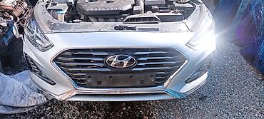 Передняя часть автомобиля Hyundai Sonata (рестайлинг, примерно