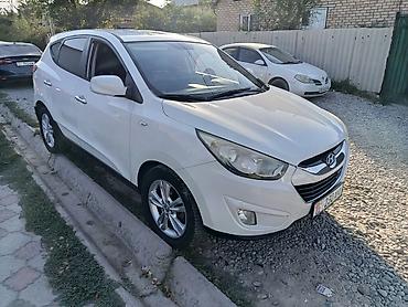парковочная автовизитка: Hyundai Tucson: 2010 г., 2 л, Автомат, Дизель, Кроссовер — 4