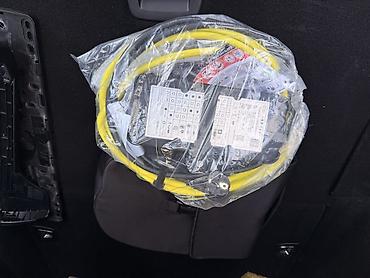 трос для машины цена: Портативное зарядное устройство для электромобилей (EVSE) Aptiv — 2
