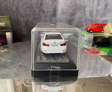 Avtomobil modelləri: Коллекционная модель BMW 750i F02 white 2008 RASTAR Scale 1:43 Art — 7