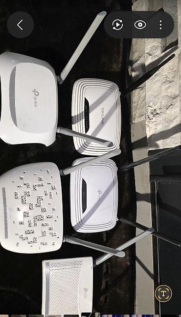 internet tap: TP-Link Wi‑Fi marşrutlaşdırıcıları və modemlər toplusu - Marka — 1