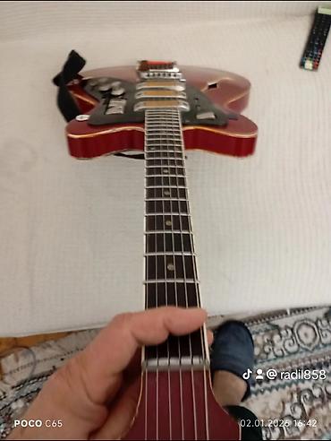 Elektro gitaralar: Elektron gitara, 6 sim, İşlənmiş, Ünvandan götürmə — 15