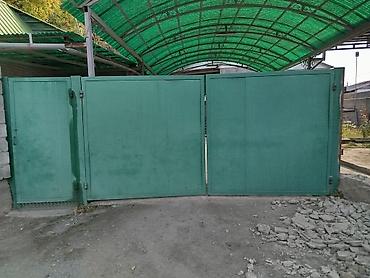 Металлические распашные ворота с калиткой - Конструкция