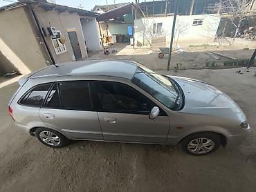 Mazda Familia: 2003 г., 1.6 л, Механика, Бензин, Универсал — 6