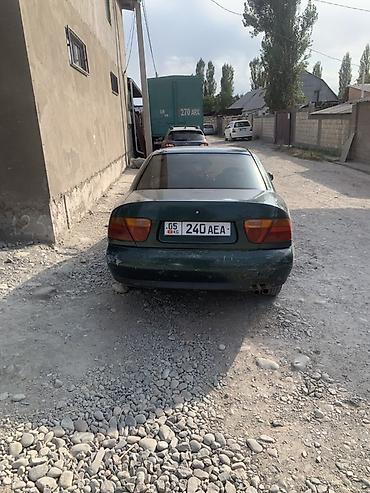 Mazda 323: 1998 г., 1.8 л, Механика, Бензин, Седан