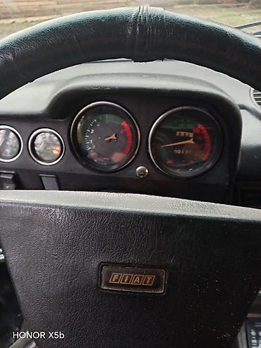 canqan uni z: VAZ 2106, mavi rəng. Klassik sedan gövdə, xrom ön barmaqlıq və dəyirmi — 9
