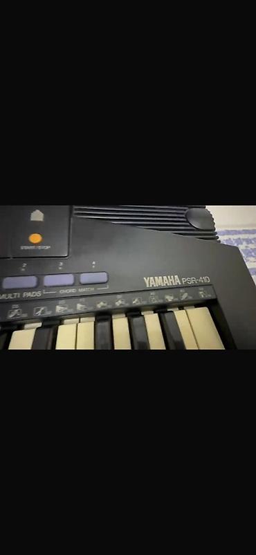 Синтезаторы: Синтезатор Yamaha PSR-410 - 61 полноразмерная клавиша - Встроенные — 2