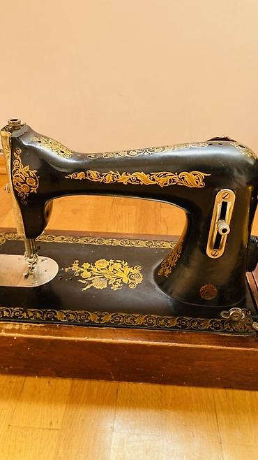 gitara temiri: Məhsul: Mexaniki tikiş maşını (əl çarxlı) Təsvir: - Klassik dizaynlı — 2