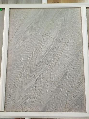 Açıq boz tonlarda, ağac naxışlı döşəmə örtüyü (laminat tipli panel) lalafo.az -da Açıq boz tonlarda, ağac naxışlı döşəmə örtüyü (laminat tipli panel)