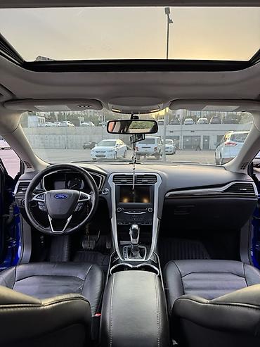 Транспорт: Ford Fusion sedan – mavi rəng, 4 qapı, ön və arxa park yerlərində — 9