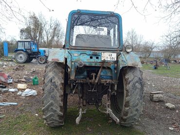 Traktorlar: Mavi rəngli təkərli kənd təsərrüfatı traktoru. Texniki xüsusiyyət və — 7