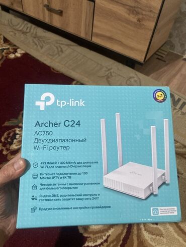 Модемы и сетевое оборудование: Двухдиапазонный Wi-Fi роутер TP-Link Archer C24 AC750. Поддерживает