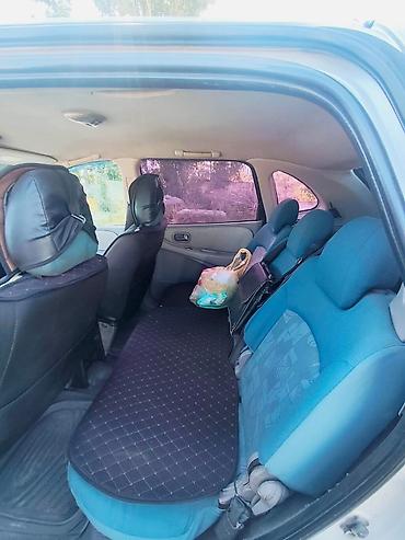 e6 3: Nissan Almera Tino: 2000 г., 1.8 л, Механика, Бензин, Хэтчбэк — 8
