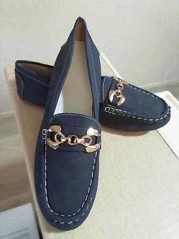 ugg sunjalice: Nove ženske teget mokasine 41 broj. Unutrašnje gazište 26 cm — 1