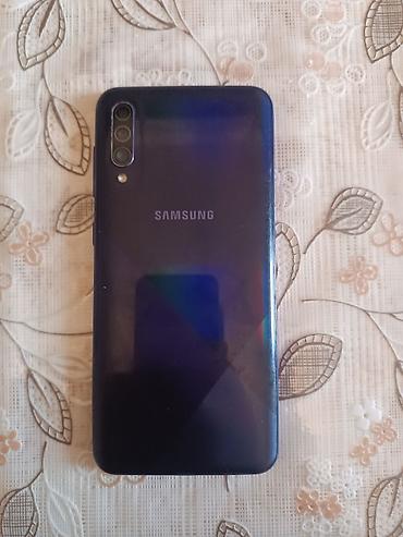 samsung tablet qiymetleri: Samsung Galaxy A30s, rəng - Qara, Barmaq izi — 2