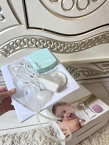joyor s10: Электрический молокоотсос (на коробке: Electric Breast Pump, 0% BPA) — 2
