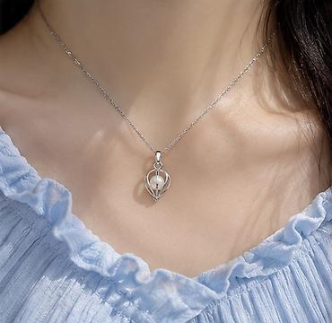 amber elixir: Подвеска с жемчугом в серебристой оправе - Украшение: изящная — 2