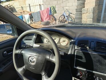 машина мало литровка на рассрочку: Mazda 323: 2003 г., 2 л, Механика, Дизель, Седан