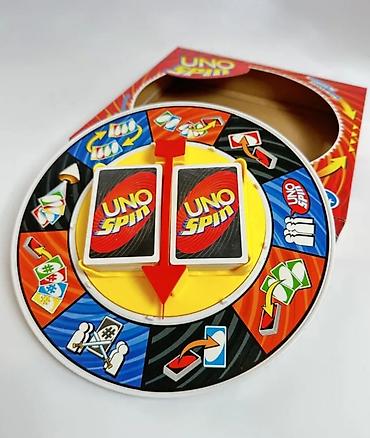 pop puck: УНО Спин (UNO Spin) — это новая версия классической игры УНО Успейте — 2