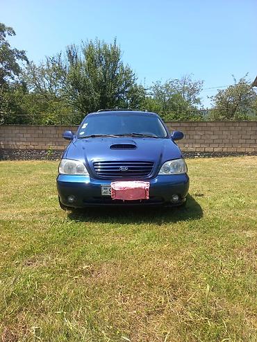 Kia: Kia Carnival: 2.9 l | 2002 il Van/Minivan — 12