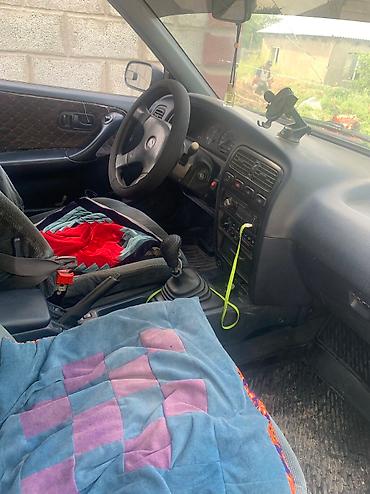 chek it: Nissan Primera: 1994 г., 1.6 л, Механика, Бензин, Хэтчбэк — 6