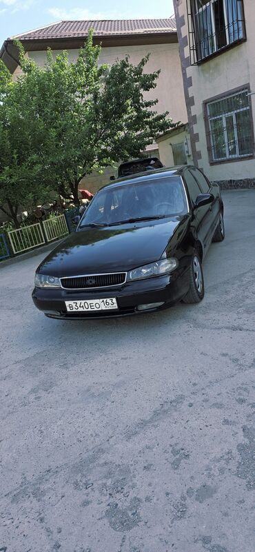 Kia: Kia Clarus: 1998 г., 2 л, Механика, Газ, Седан