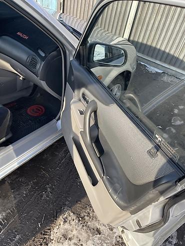 Mazda: Mazda 323: 2003 г., 1.6 л, Бензин, Универсал — 12