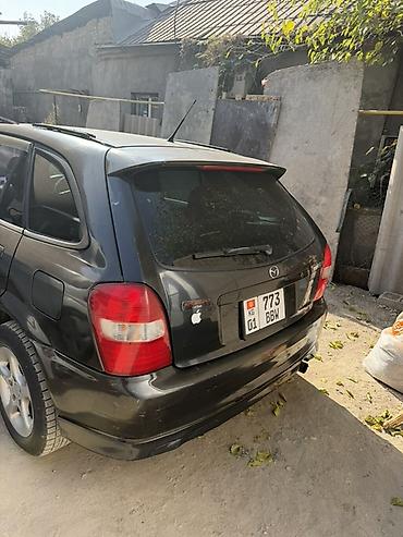 мустанг авто: Mazda 323: 2001 г., 2 л, Автомат, Газ, Универсал — 9