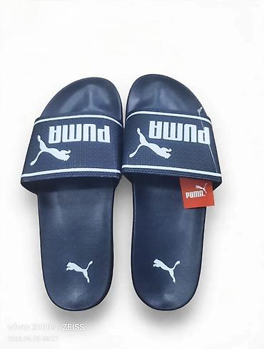 planika kucne papuce: PUMA unisex papuče – klasične “slide” sandale - Brend: PUMA - Model — 3