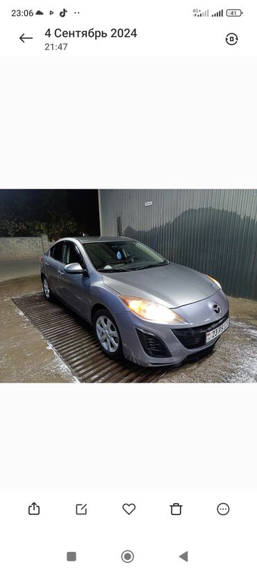 шины бу бишкек оптом: Автомобиль Mazda 3, выполненный в кузове седан и окрашенный в серый