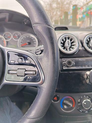 səs boqucu moto: MERCEDES-BENZ çoxfunksiyalı sükan - Mercedes-Benz üçşaxeli dizayn — 9