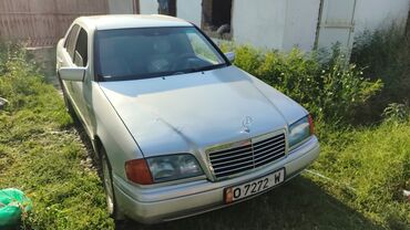 авто в рассрочку: Седан Mercedes-Benz C-Class серебристого цвета, оборудованный