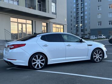 Kia: Kia Optima – ağ rəngli, zərif sedan Xarici xüsusiyyətlər: - Aqressiv — 20