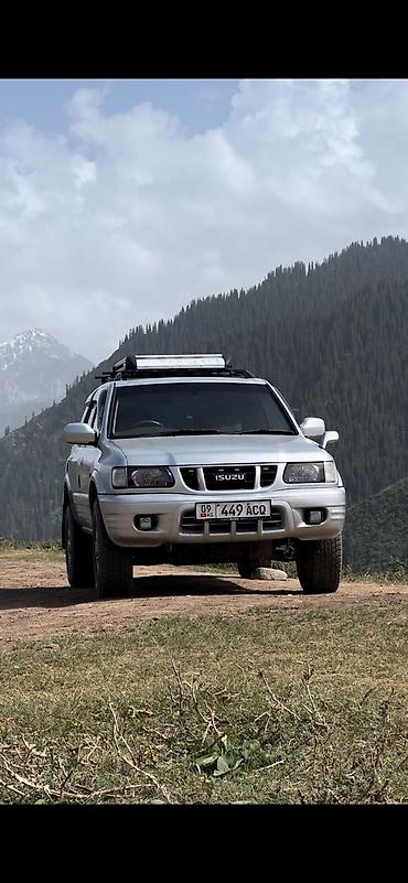 машинелер: Isuzu Wizard: 2002 г., 3.2 л, Кол менен иштөөчү, Бензин, Жол тандабас — 1