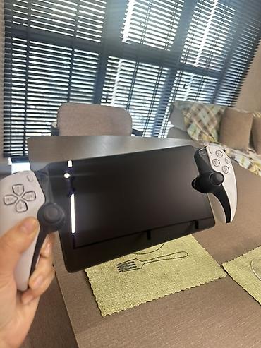 oyunu: Tam yenidir. Qiymetde anlasmaq olar Sony PlayStation Portal Remote — 1