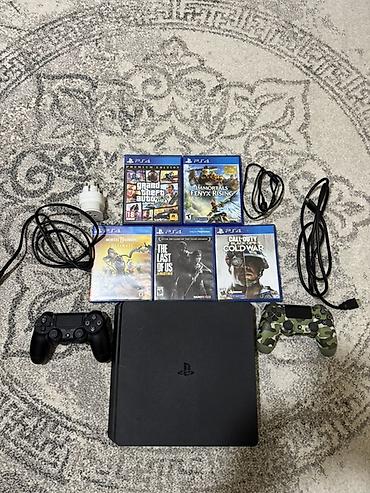 Игровая консоль Sony PlayStation 4 Slim объемом памяти 1 ТБ (черная) с at lalafo.kg Игровая консоль Sony PlayStation 4 Slim объемом памяти 1 ТБ (черная) с