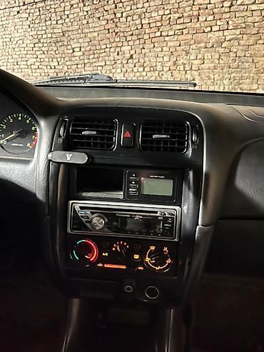 Mazda: Mazda Capella: 2000 г., 1.8 л, Механика, Бензин, Универсал — 13