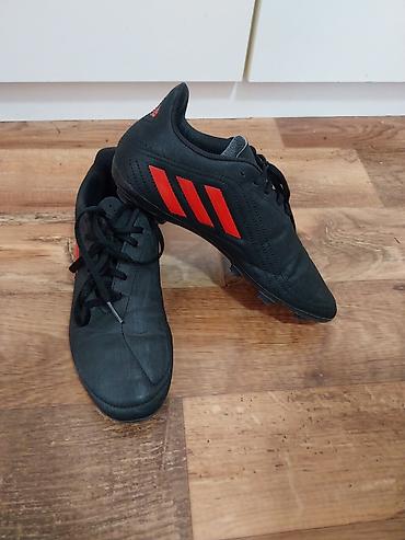 Kopačke: Fudbalske kopačke Adidas – crne sa crvenim prugama - Model sa — 1
