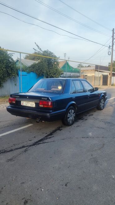 молочное оборудование: Nissan Bluebird: 1989 г., 2 л, Механика, Бензин, Седан