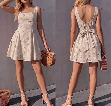 elegant draskovic: Haljina od pamučne broderije, mini dužine i A-kroja. Prednji deo ima — 1