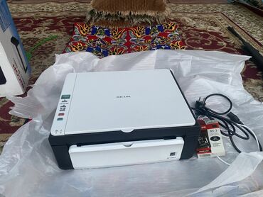 наушник кыргызча: МФУ Ricoh Aficio SP 100SU Компактное лазерное устройство «3 в 1»