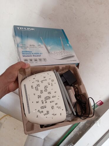 adsl tp link modem: Tp link 2 antenali. Hec bir problemi yoxdur. WhatsApp a yazin