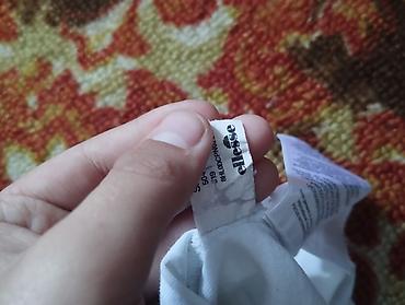 Футболки: Футболка Ellesse, белая, с крупным фирменным логотипом на груди — 4