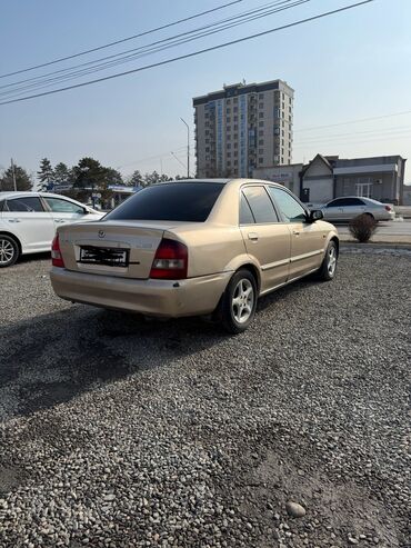 mazda 323 транспорт: Mazda 323: 2001 г., 1.6 л, Автомат, Бензин, Седан