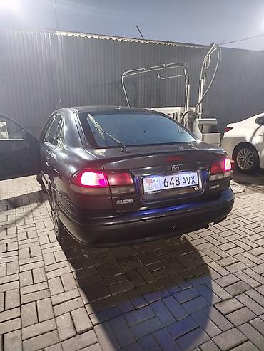 626: Mazda 626: 1997 г., 2 л, Механика, Бензин, Хэтчбэк — 4