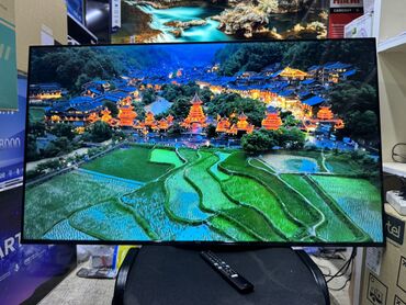 Телевизоры: Телевизор TCL 50V6B, LED, черный Описание Используйте голос для — 10