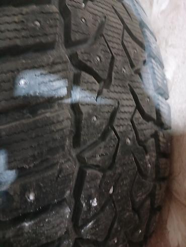 зимнее: Зимняя шипованная шина 225/60 R18. Характеристики: - Тип: зимняя, с — 1