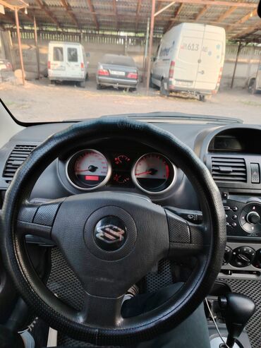 продаю связи с переездом: Suzuki Ignis: 2004 г., 1.5 л, Автомат, Бензин, Седан
